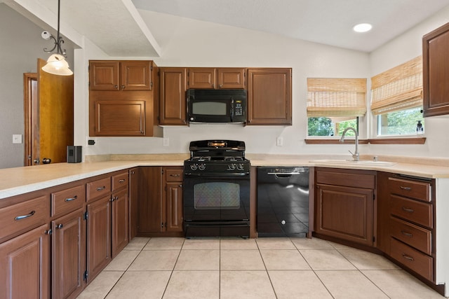 36 Palomas Rd, Los Lunas, NM 87031 - kitchen with black appliances, lofted ceiling, light countertops, hanging light fixtures, and light tile patterned floors