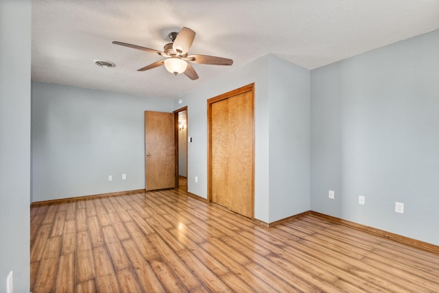 36 Palomas Rd, Los Lunas, NM 87031 - empty room with light wood-style floors and ceiling fan