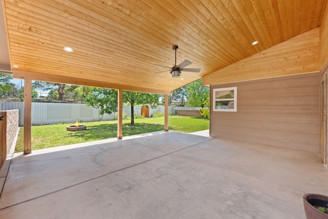 36 Palomas Rd, Los Lunas, NM 87031 - fenced backyard featuring a patio area, ceiling fan, and an outdoor fire pit