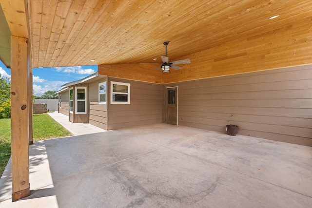 36 Palomas Rd, Los Lunas, NM 87031 - view of patio with ceiling fan and an attached carport