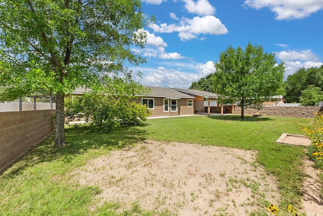 36 Palomas Rd, Los Lunas, NM 87031 - view of yard with a patio
