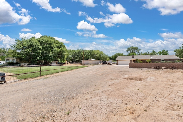 36 Palomas Rd, Los Lunas, NM 87031 - view of yard featuring driveway