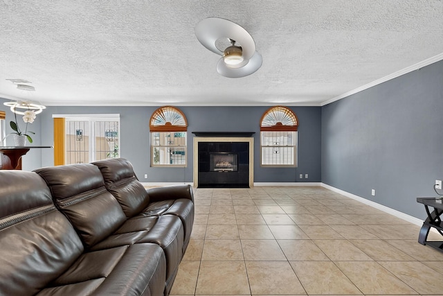 5415 Colleens Way NE, Albuquerque, NM 87111 - living area featuring plenty of natural light, ornamental molding, a textured ceiling, a tile fireplace, and light tile patterned floors