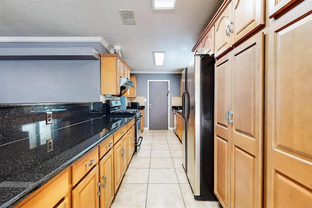5415 Colleens Way NE, Albuquerque, NM 87111 - kitchen with appliances with stainless steel finishes, crown molding, dark stone countertops, light tile patterned flooring, and a textured ceiling