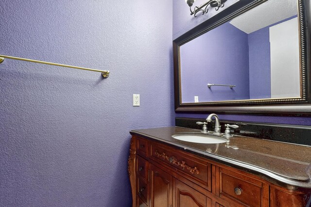 5415 Colleens Way NE, Albuquerque, NM 87111 - bathroom with a textured wall and vanity