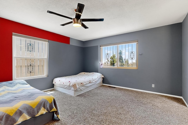 5415 Colleens Way NE, Albuquerque, NM 87111 - bedroom featuring carpet flooring, a ceiling fan, and a textured ceiling