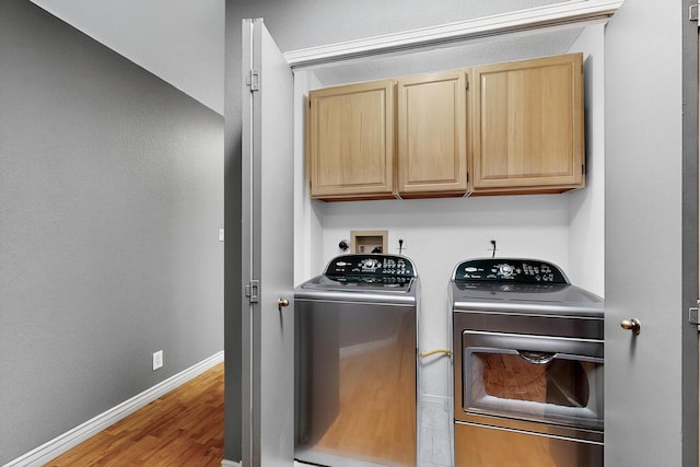 5415 Colleens Way NE, Albuquerque, NM 87111 - laundry room with separate washer and dryer, cabinet space, and wood finished floors