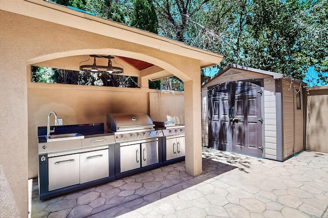 5415 Colleens Way NE, Albuquerque, NM 87111 - view of patio featuring area for grilling, a storage unit, and a gazebo
