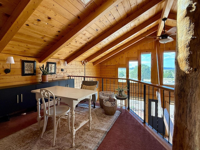 195 Ferguson Rd, Ramah, NM 87321 - dining space featuring wooden walls, wooden ceiling, carpet flooring, and a ceiling fan
