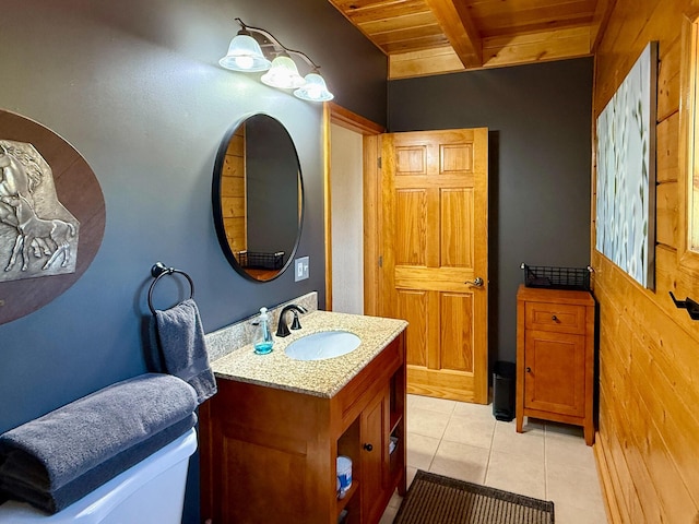 195 Ferguson Rd, Ramah, NM 87321 - bathroom with a wooden ceiling with exposed beams, vanity, and tile patterned floors