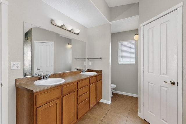 2048 N Ensenada Cir SE, Rio Rancho, NM 87124 - full bath featuring double vanity, tile patterned flooring, and a shower