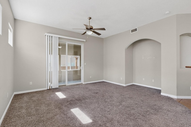2048 N Ensenada Cir SE, Rio Rancho, NM 87124 - carpeted spare room featuring ceiling fan and arched walkways