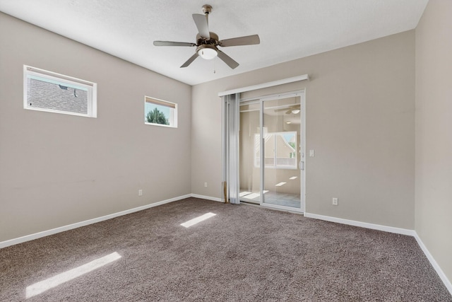 2048 N Ensenada Cir SE, Rio Rancho, NM 87124 - carpeted empty room with healthy amount of natural light and ceiling fan