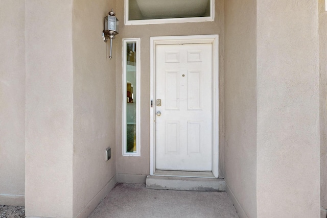 2048 N Ensenada Cir SE, Rio Rancho, NM 87124 - entrance to property featuring stucco siding