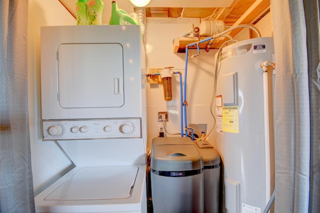 58 Quiet Valley Loop, Edgewood, NM 87015 - laundry area featuring electric water heater and stacked washer / drying machine