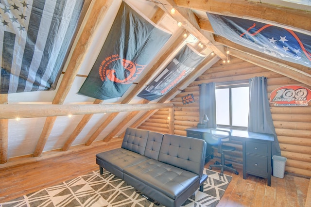 58 Quiet Valley Loop, Edgewood, NM 87015 - sitting room featuring log walls and hardwood / wood-style flooring