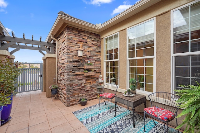 2308 Desert View Rd NE, Rio Rancho, NM 87144 - view of patio with a gate