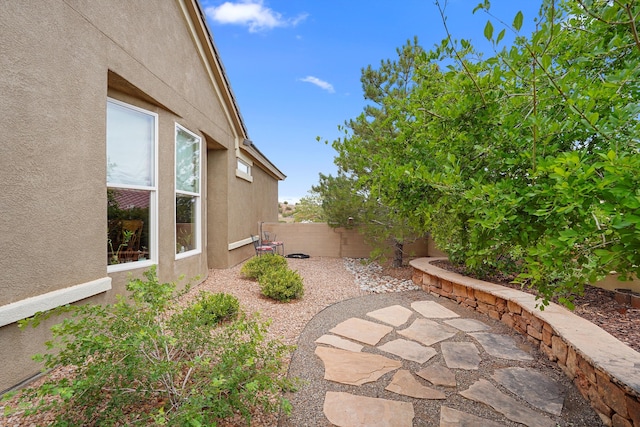 2308 Desert View Rd NE, Rio Rancho, NM 87144 - fenced backyard with a patio