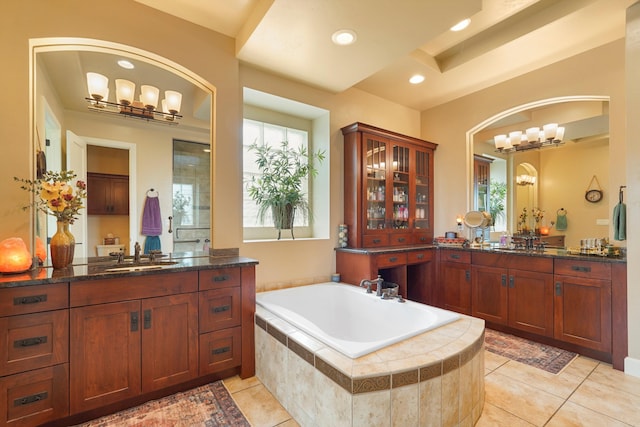 2308 Desert View Rd NE, Rio Rancho, NM 87144 - full bathroom featuring tile patterned flooring, a garden tub, plenty of natural light, vanity, and recessed lighting