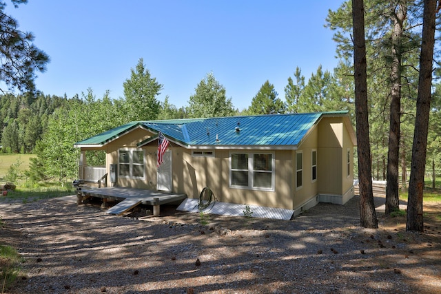 150 Ponderosa Way, Jemez Springs, NM 87025 - manufactured / mobile home featuring a wooden deck and a metal roof