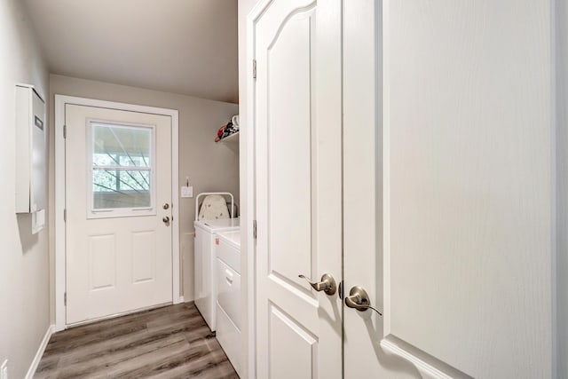 150 Ponderosa Way, Jemez Springs, NM 87025 - washroom featuring independent washer and dryer and light wood-style floors