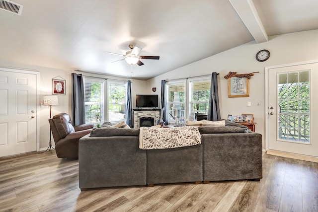 150 Ponderosa Way, Jemez Springs, NM 87025 - living area with a ceiling fan, light wood-style floors, and a stone fireplace
