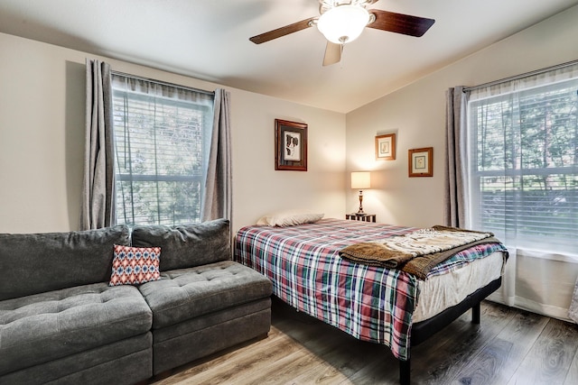 150 Ponderosa Way, Jemez Springs, NM 87025 - bedroom featuring wood finished floors, vaulted ceiling, and ceiling fan