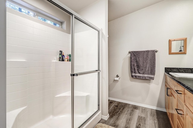 150 Ponderosa Way, Jemez Springs, NM 87025 - bathroom with vanity, a shower stall, and wood finished floors