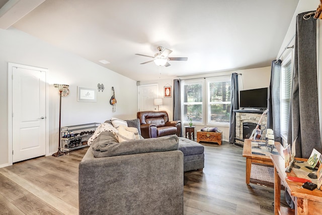 150 Ponderosa Way, Jemez Springs, NM 87025 - living area with ceiling fan, light wood-type flooring, and a stone fireplace