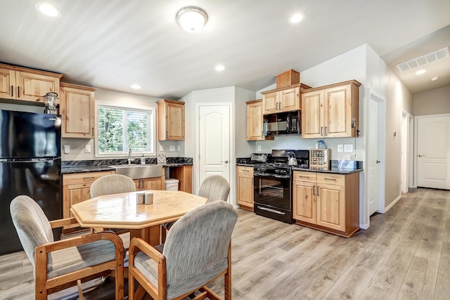 150 Ponderosa Way, Jemez Springs, NM 87025 - kitchen with black appliances, light brown cabinetry, dark countertops, and recessed lighting