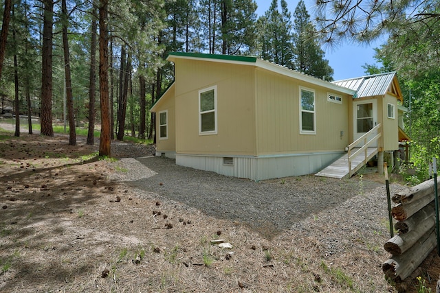 150 Ponderosa Way, Jemez Springs, NM 87025 - view of side of home with a metal roof