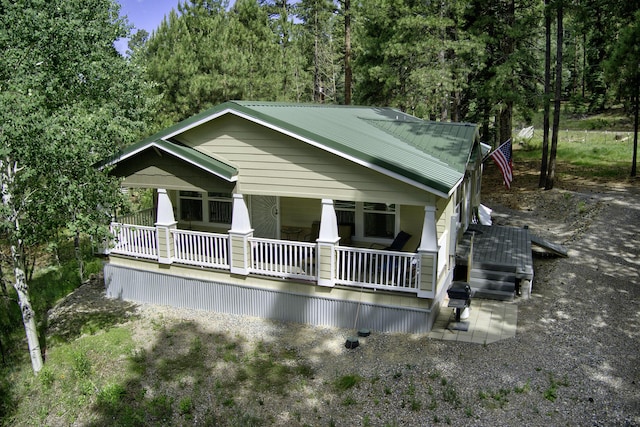 150 Ponderosa Way, Jemez Springs, NM 87025 - view of front of home with a metal roof and a porch