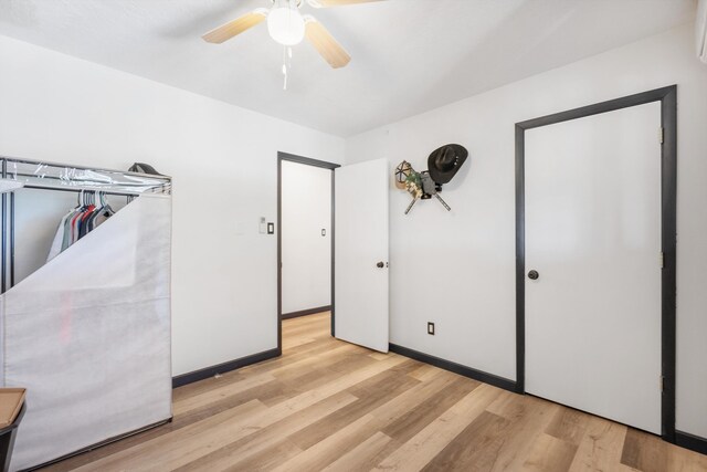 1257 Dinkle Rd, Stanley, NM 87056 - unfurnished bedroom featuring light wood finished floors and ceiling fan