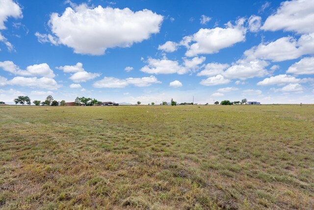 1257 Dinkle Rd, Stanley, NM 87056 - view of green lawn featuring a rural view