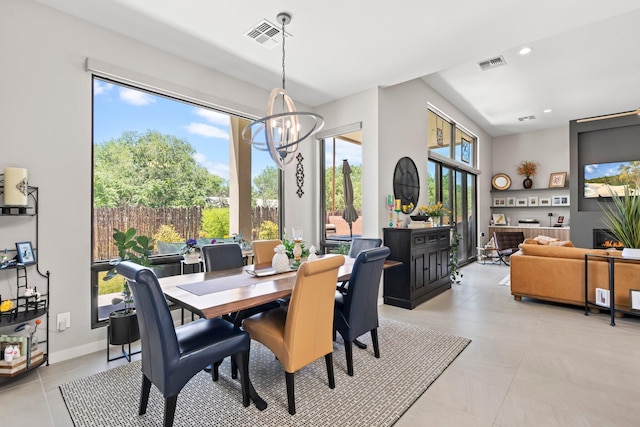 3204 Maxum Ln NW, Albuquerque, NM 87104 - dining space with a chandelier, recessed lighting, and light tile patterned floors