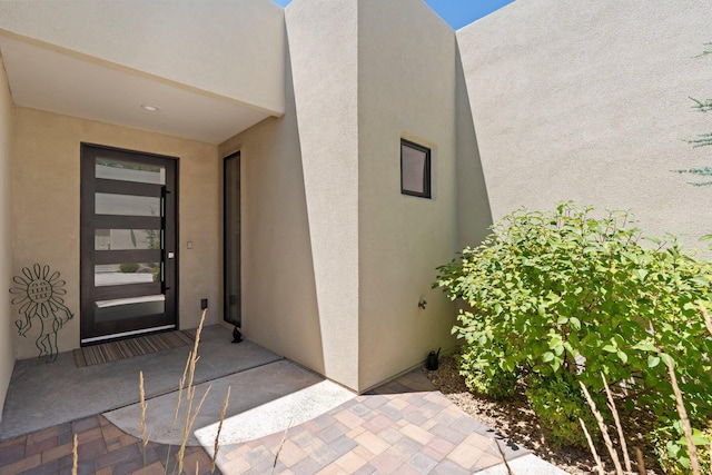 3204 Maxum Ln NW, Albuquerque, NM 87104 - view of exterior entry with stucco siding