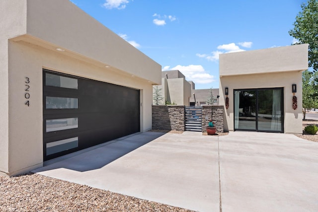 3204 Maxum Ln NW, Albuquerque, NM 87104 - garage featuring driveway