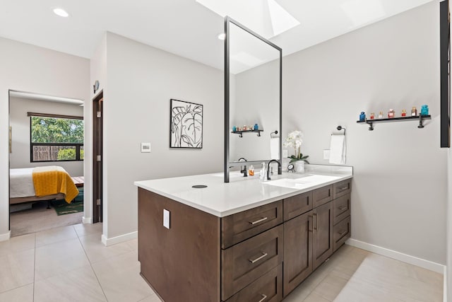 3204 Maxum Ln NW, Albuquerque, NM 87104 - bathroom featuring vanity, tile patterned floors, recessed lighting, and connected bathroom