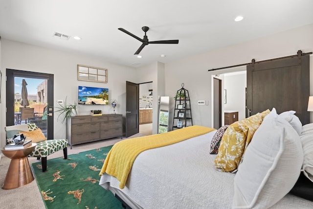 3204 Maxum Ln NW, Albuquerque, NM 87104 - carpeted bedroom featuring a barn door, access to exterior, multiple windows, recessed lighting, and ceiling fan