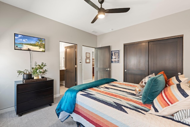 3204 Maxum Ln NW, Albuquerque, NM 87104 - bedroom featuring light colored carpet, a closet, ceiling fan, and ensuite bath