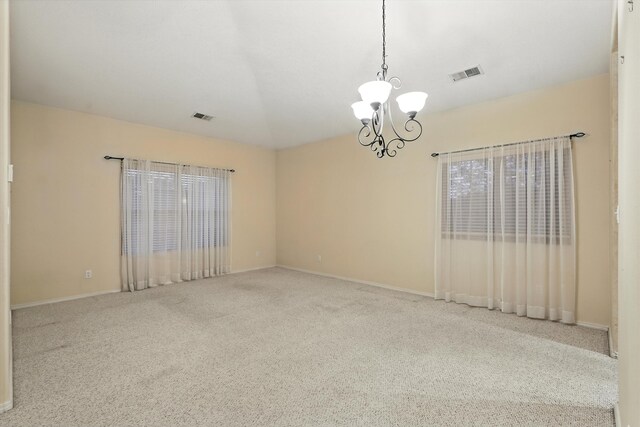 736 Gray Hawk Dr NE, Rio Rancho, NM 87144 - empty room featuring a chandelier and carpet
