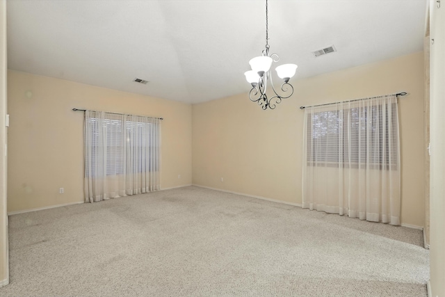 736 Gray Hawk Dr NE, Rio Rancho, NM 87144 - carpeted empty room featuring a chandelier and baseboards