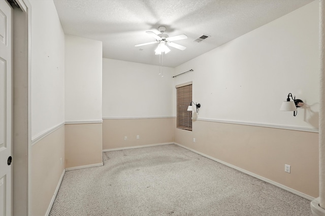 736 Gray Hawk Dr NE, Rio Rancho, NM 87144 - spare room featuring a ceiling fan, carpet, and a textured ceiling