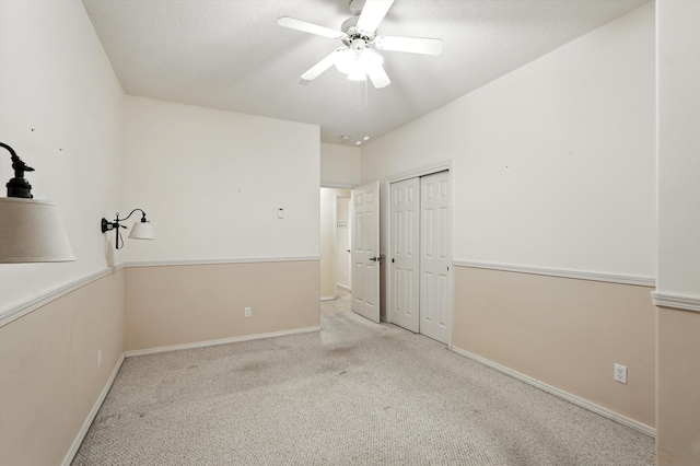 736 Gray Hawk Dr NE, Rio Rancho, NM 87144 - unfurnished bedroom featuring carpet floors, a closet, and ceiling fan