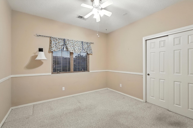 736 Gray Hawk Dr NE, Rio Rancho, NM 87144 - unfurnished bedroom featuring carpet flooring, a closet, and ceiling fan