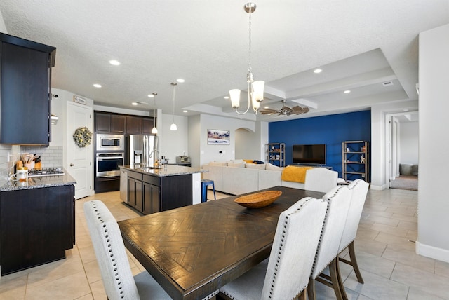 4529 Skyline Loop NE, Rio Rancho, NM 87144 - dining room with a chandelier, light tile patterned floors, recessed lighting, beamed ceiling, and coffered ceiling
