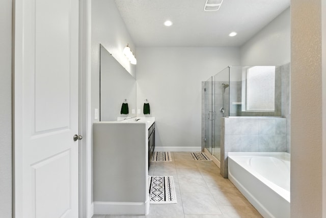 4529 Skyline Loop NE, Rio Rancho, NM 87144 - full bathroom with a shower stall, double vanity, a bath, tile patterned flooring, and recessed lighting