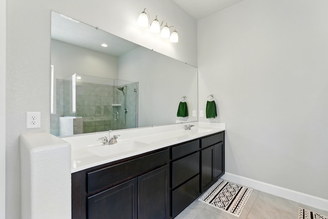 4529 Skyline Loop NE, Rio Rancho, NM 87144 - full bathroom featuring double vanity, a tile shower, and tile patterned floors