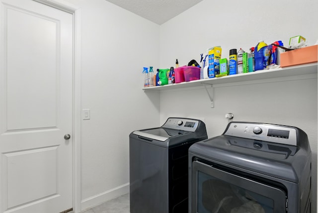 4529 Skyline Loop NE, Rio Rancho, NM 87144 - laundry area featuring washer and dryer and baseboards