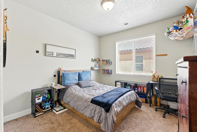 4529 Skyline Loop NE, Rio Rancho, NM 87144 - carpeted bedroom featuring a textured ceiling and baseboards